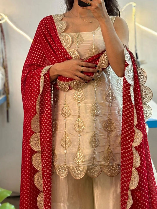 Ivory tissue kurta-palazzo with red dupatta