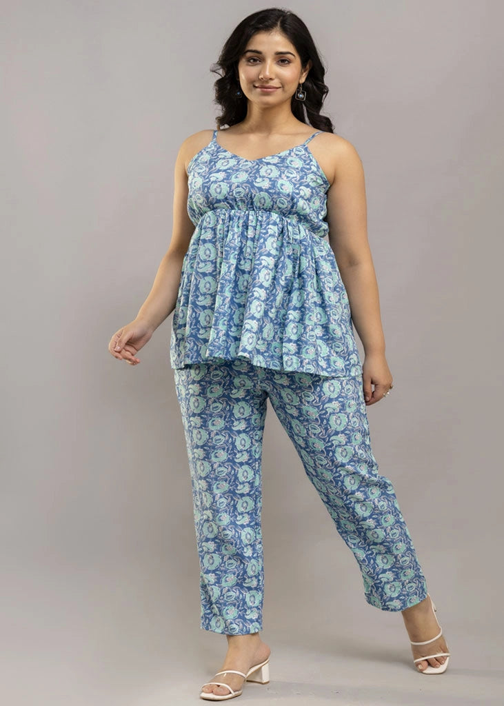 Women’s blue floral co-ord set with sleeveless spaghetti strap top and matching rayon pants — lightweight, breezy, and perfect for summer style and all-day comfort.