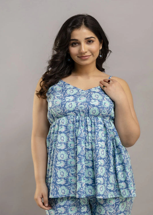 Women’s blue floral co-ord set with sleeveless spaghetti strap top and matching rayon pants — lightweight, breezy, and perfect for summer style and all-day comfort.