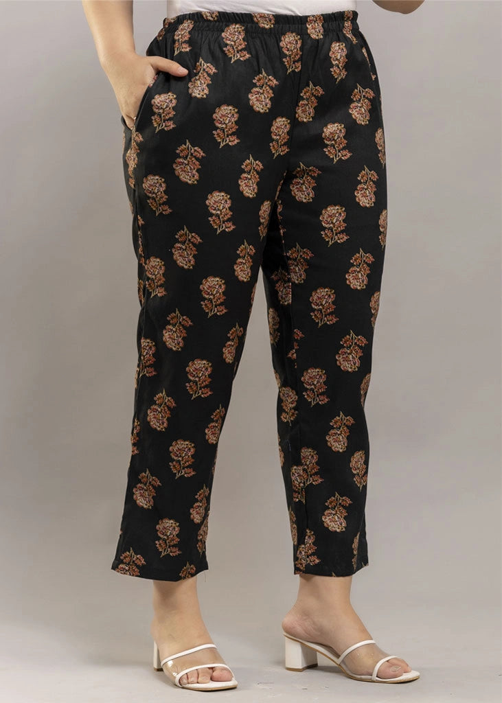 Women’s aqua floral co-ord set featuring a sleeveless spaghetti strap top and matching rayon pants — soft, breathable, and ideal for sunny days and effortless charm.