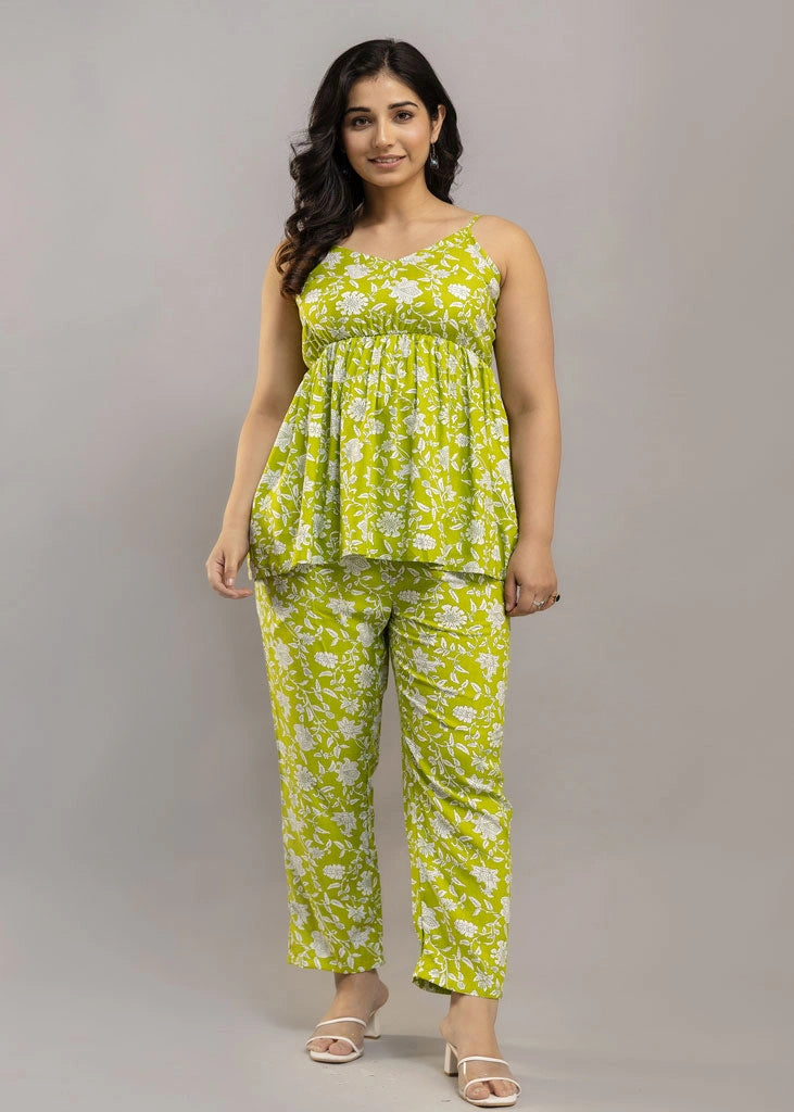 Women’s lime green floral co-ord set with sleeveless spaghetti strap top and matching premium rayon pants — lightweight and stylish for sunny days and casual outings.