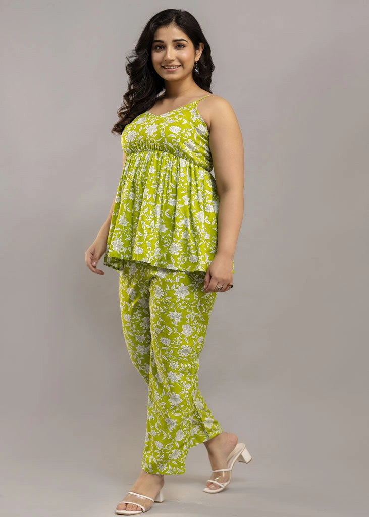 Women’s lime green floral co-ord set with sleeveless spaghetti strap top and matching premium rayon pants — lightweight and stylish for sunny days and casual outings.
