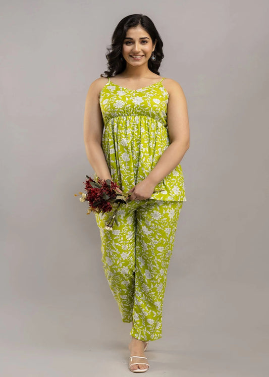 Women’s lime green floral co-ord set with sleeveless spaghetti strap top and matching premium rayon pants — lightweight and stylish for sunny days and casual outings.