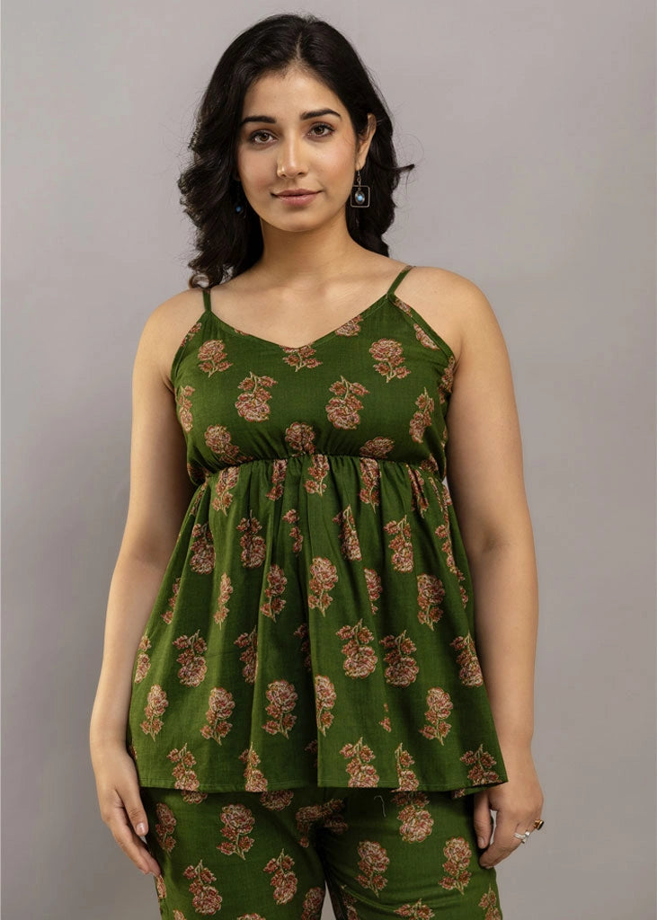 Women’s pistachio green floral co-ord set featuring a sleeveless spaghetti strap top and matching premium rayon pants — a breezy, stylish pick for summer outings and casual wear.