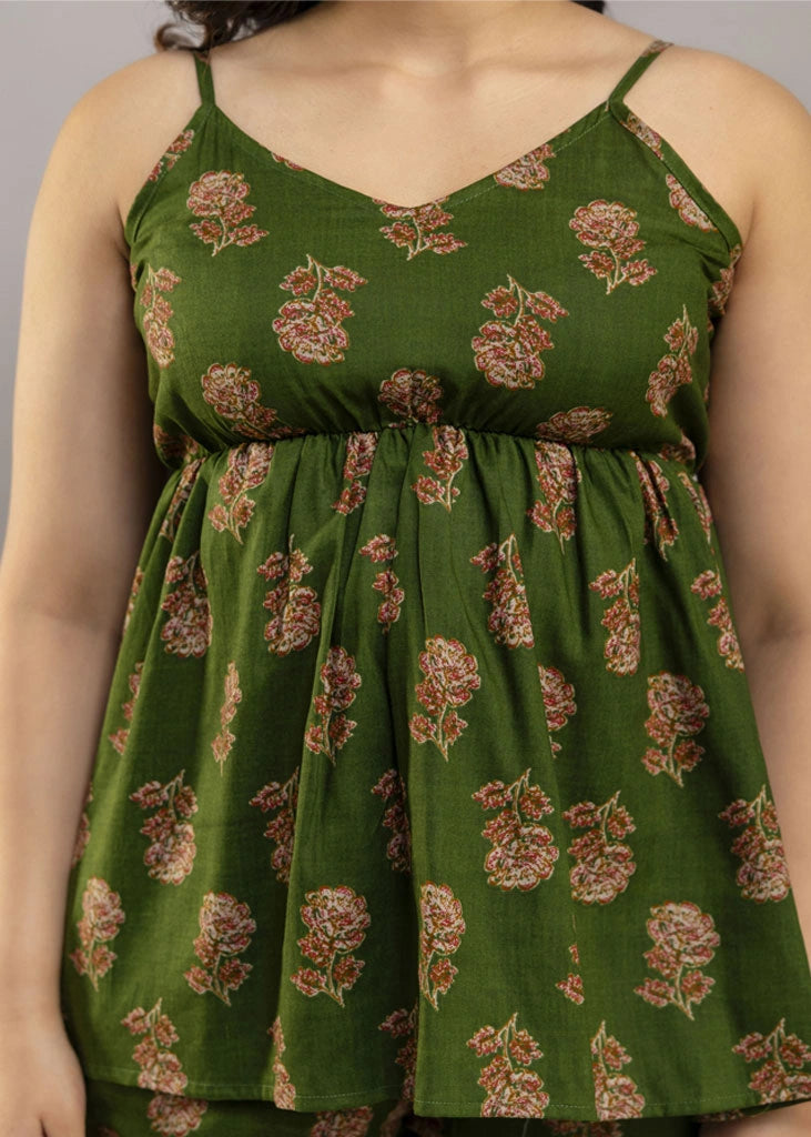 Women’s pistachio green floral co-ord set featuring a sleeveless spaghetti strap top and matching premium rayon pants — a breezy, stylish pick for summer outings and casual wear.
