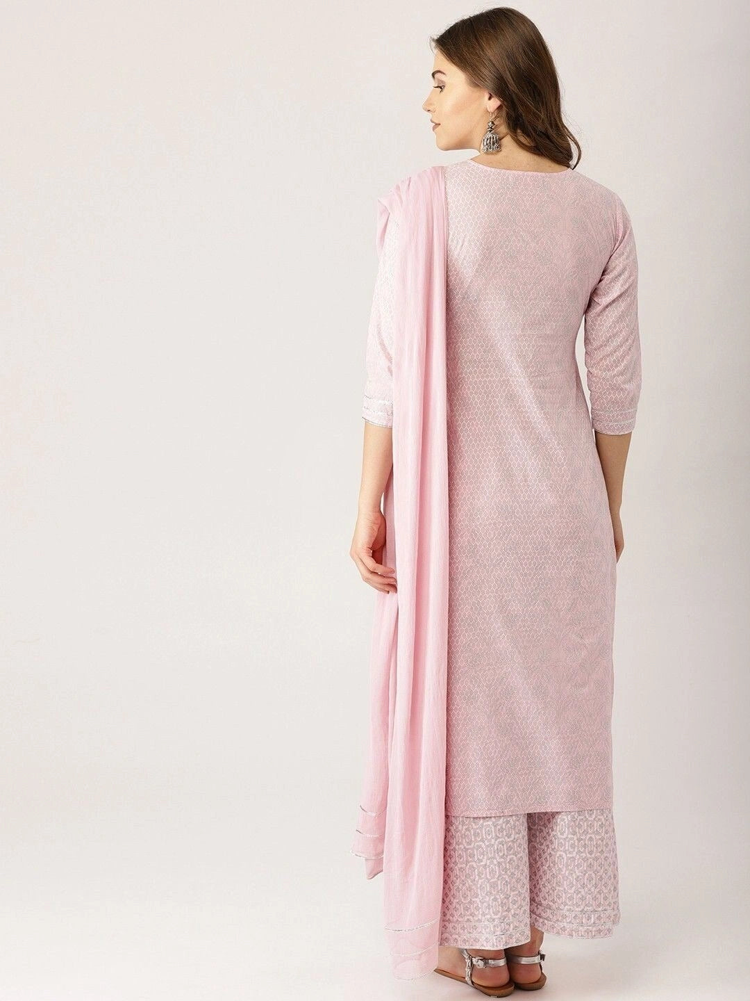 Women’s light pink ethnic motifs printed kurta set with silver gotta patti work, featuring a straight-fit kurta with keyhole neckline, three-quarter sleeves, flared palazzo pants, and a matching sheer dupatta.
