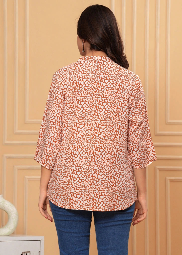 Orange cotton straight tunic top for women with three-quarter sleeves, designed with breathable fabric and a flattering fit ideal for casual, work, or semi-formal wear.