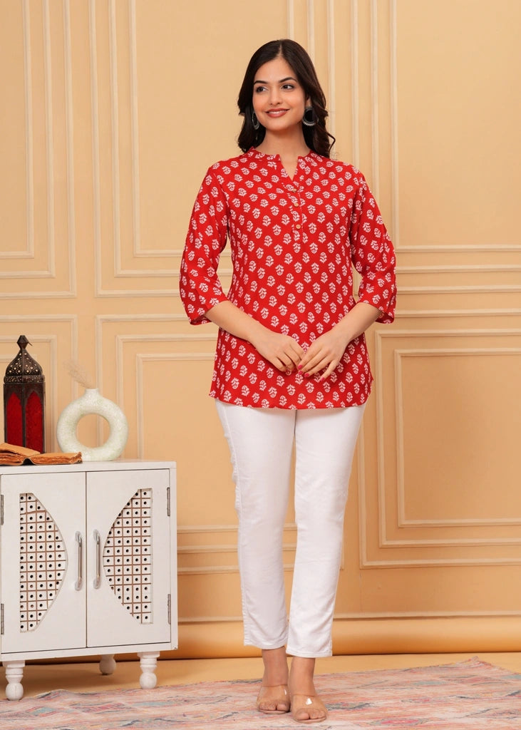 Red printed cotton straight tunic top for women with three-quarter sleeves, featuring breathable fabric and a flattering silhouette perfect for casual, work, or semi-formal wear.