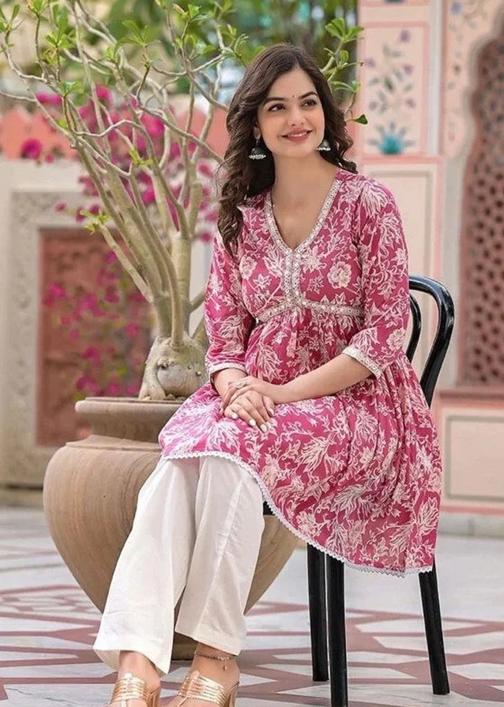 Women’s pure rayon cotton printed kurta and pant set featuring mirror embroidery at the neckline, lace detailing at the daman, 3/4th sleeves, and a plain matching pant — ideal for festive and casual occasions.