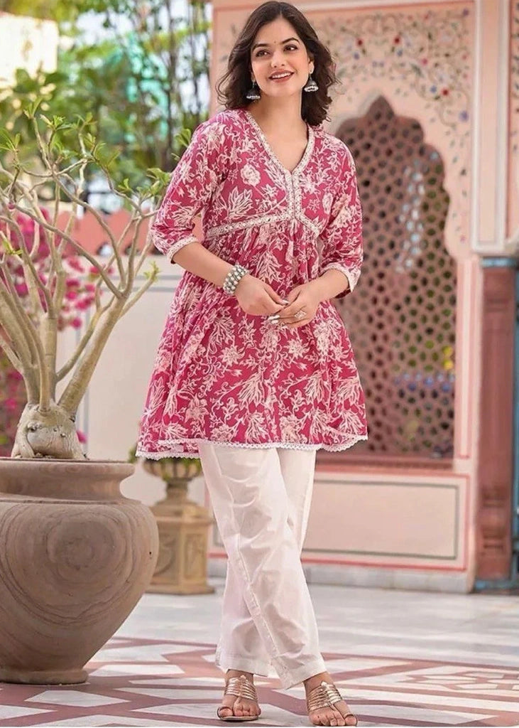 Women’s pure rayon cotton printed kurta and pant set featuring mirror embroidery at the neckline, lace detailing at the daman, 3/4th sleeves, and a plain matching pant — ideal for festive and casual occasions.