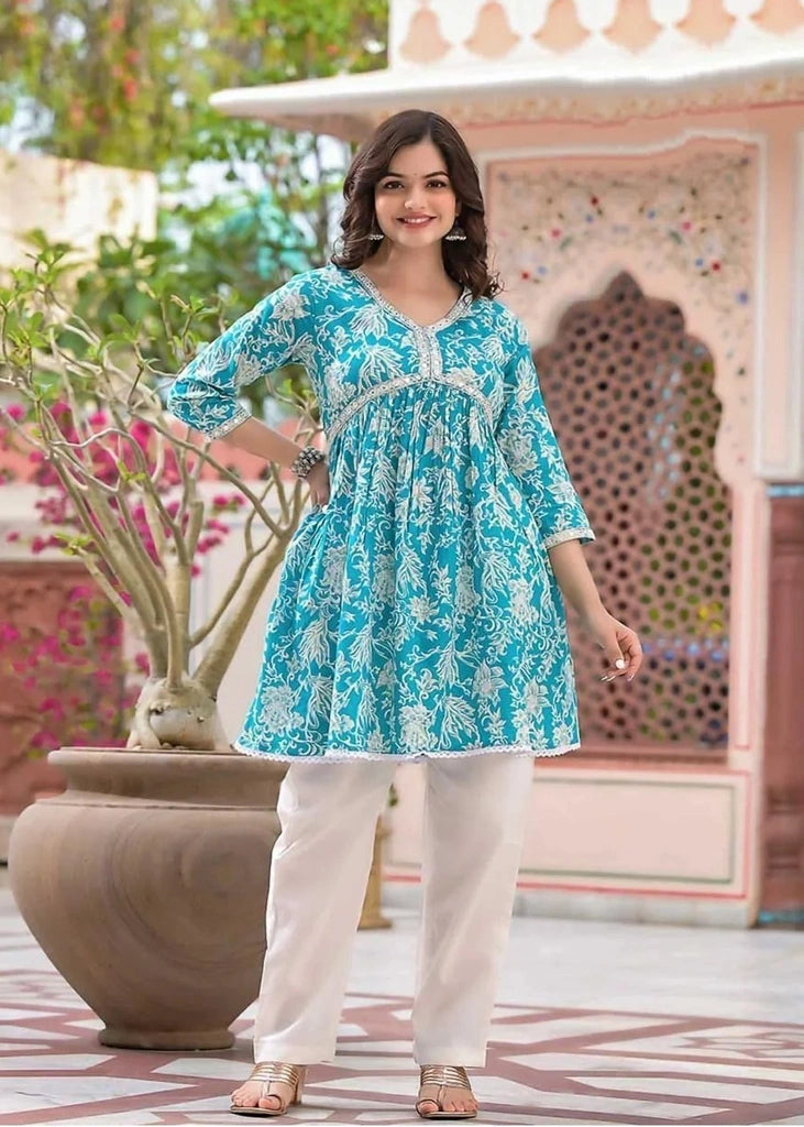 Women’s pure rayon cotton printed kurta and pant set featuring mirror embroidery at the neckline, lace detailing at the daman, 3/4th sleeves, and a plain matching pant — ideal for festive and casual occasions.