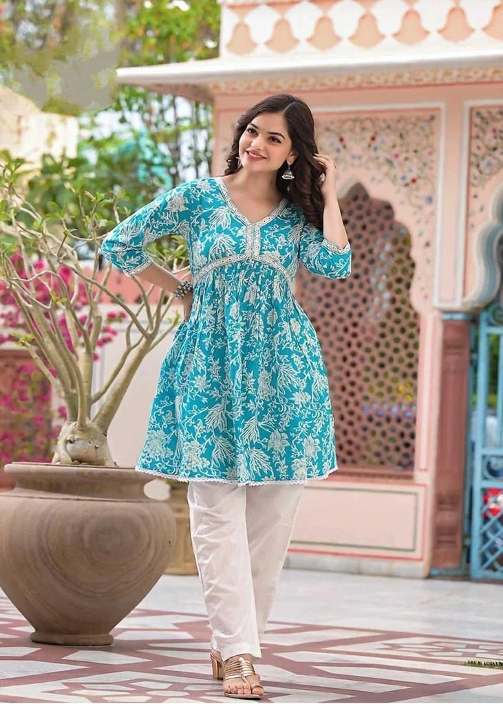 Women’s pure rayon cotton printed kurta and pant set featuring mirror embroidery at the neckline, lace detailing at the daman, 3/4th sleeves, and a plain matching pant — ideal for festive and casual occasions.