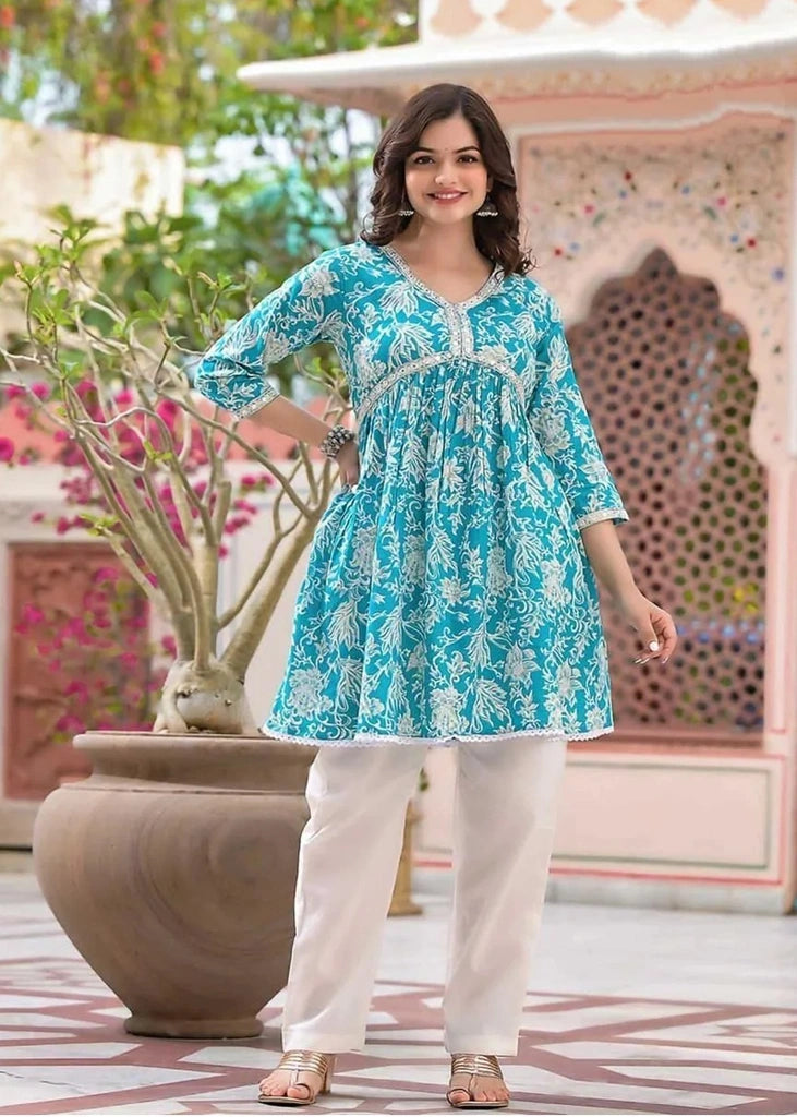 Women’s pure rayon cotton printed kurta and pant set featuring mirror embroidery at the neckline, lace detailing at the daman, 3/4th sleeves, and a plain matching pant — ideal for festive and casual occasions.