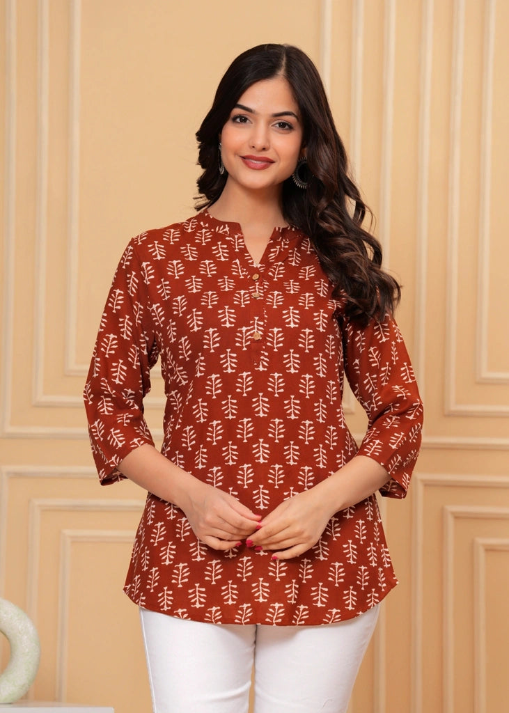 Maroon cotton straight tunic top for women with three-quarter sleeves, offering a breathable fabric and sleek silhouette ideal for work, casual outings, or semi-formal wear.