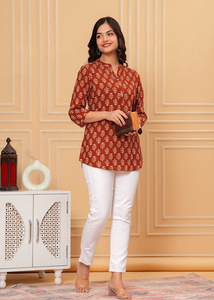 Maroon cotton straight tunic top for women with three-quarter sleeves, offering a breathable fabric and sleek silhouette ideal for work, casual outings, or semi-formal wear.