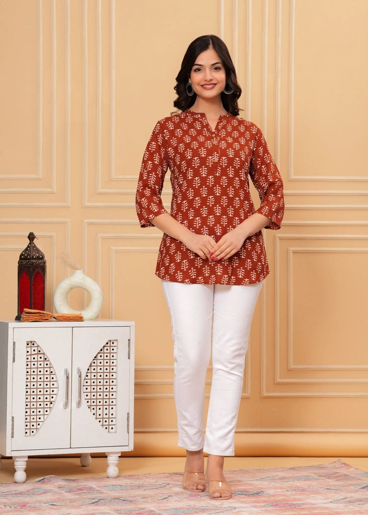 Maroon cotton straight tunic top for women with three-quarter sleeves, offering a breathable fabric and sleek silhouette ideal for work, casual outings, or semi-formal wear.