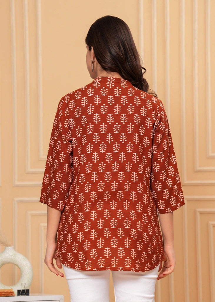 Maroon cotton straight tunic top for women with three-quarter sleeves, offering a breathable fabric and sleek silhouette ideal for work, casual outings, or semi-formal wear.