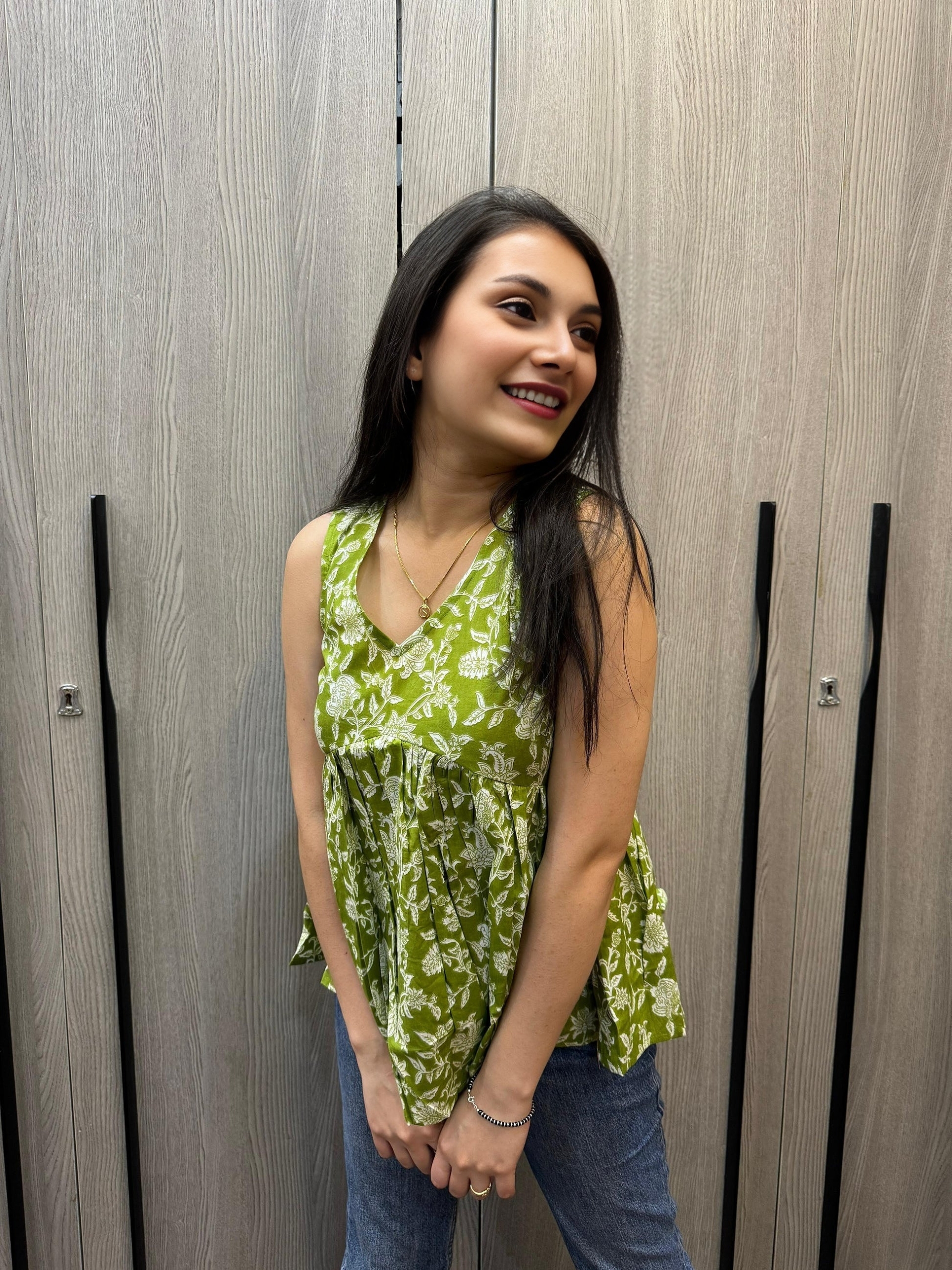 Green Sleeveless alia cut Top